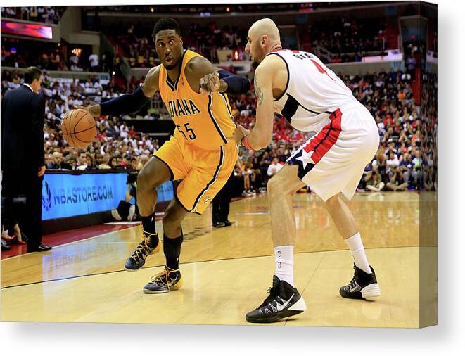Playoffs Canvas Print featuring the photograph Roy Hibbert and Marcin Gortat by Rob Carr