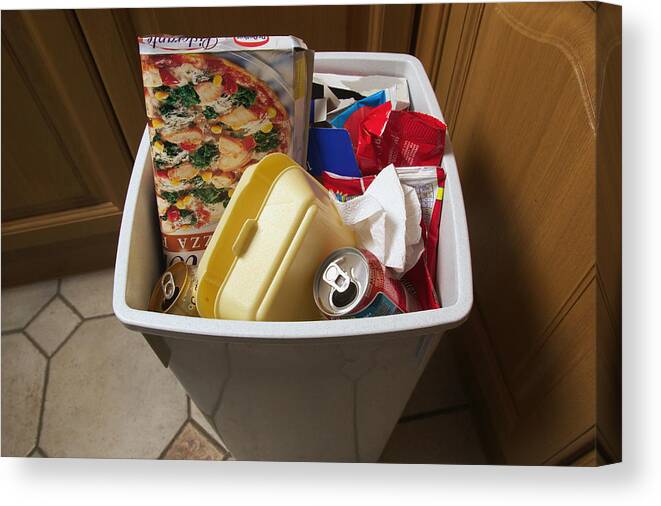 Unhealthy Eating Canvas Print featuring the photograph Rubbish bin filled with empty food packaging, close-up by GSO Images