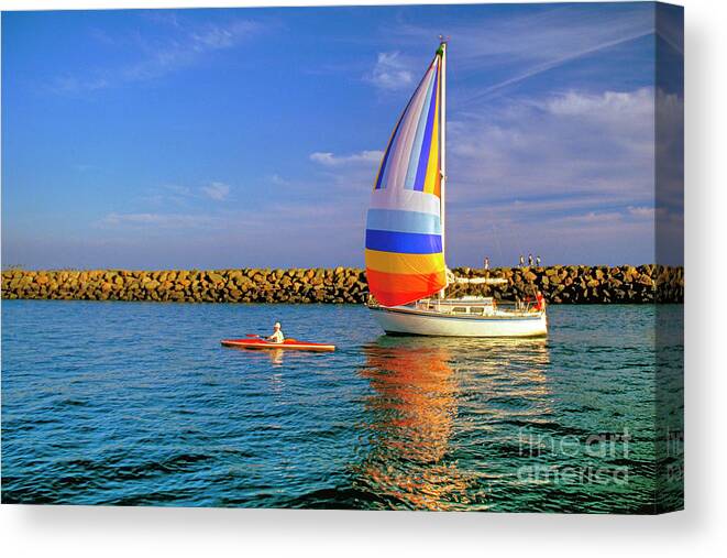 Marina Del Rey Canvas Print featuring the photograph Sailboat and Kayak Going Home by David Zanzinger