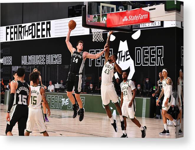 Nba Pro Basketball Canvas Print featuring the photograph San Antonio Spurs v Milwaukee Bucks by Jesse D. Garrabrant