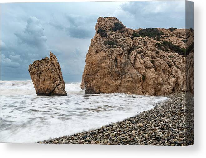 Coastline Canvas Print featuring the photograph Seascapes with windy waves. Rock of Aphrodite Paphos Cyprus by Michalakis Ppalis