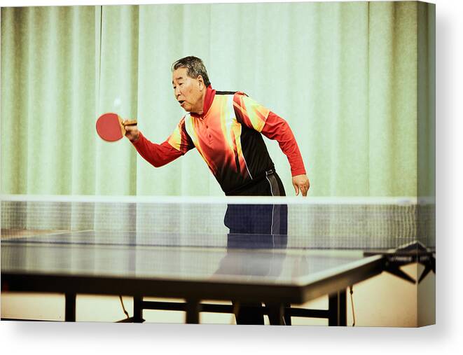 Table Tennis Racket Canvas Print featuring the photograph Senior man playing table tennis by Yoshiyoshi Hirokawa