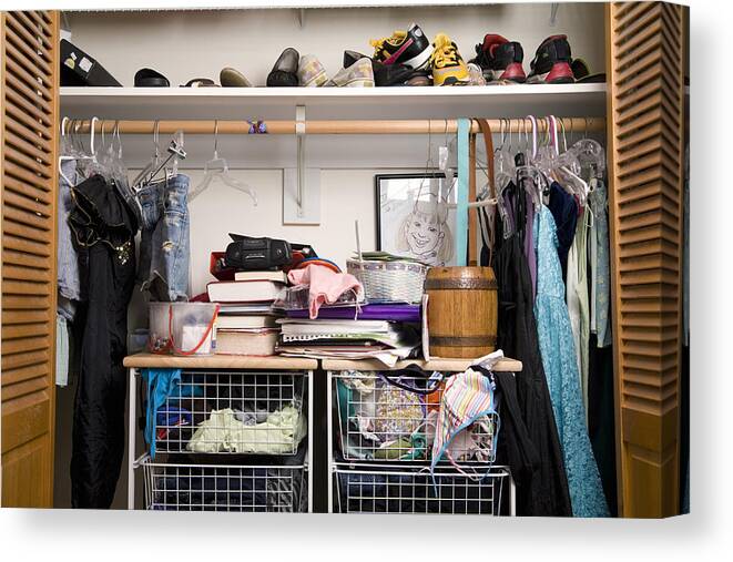 Coathanger Canvas Print featuring the photograph Shoes and clothes in closet, close-up by Dana Neely