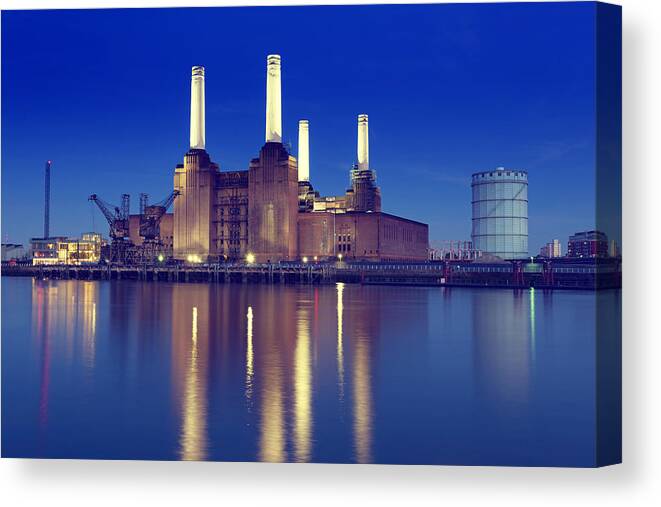 Air Pollution Canvas Print featuring the photograph Skyline of Battersea Power Station with lake reflection by _ultraforma_
