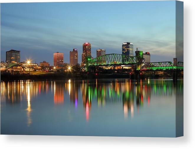 Downtown District Canvas Print featuring the photograph Skyline of Little Rock and Arkansas River by Rainer Grosskopf
