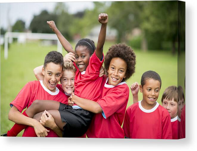 Soccer Uniform Canvas Print featuring the photograph Soccer Team Victory by FatCamera