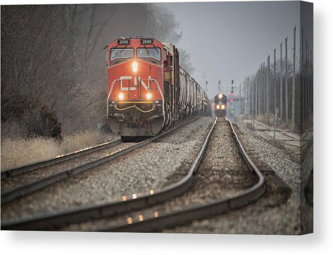 Railroad Canvas Print featuring the photograph Southbound Canadian National A432 passes CN A408 at Effingham Illinois by Jim Pearson