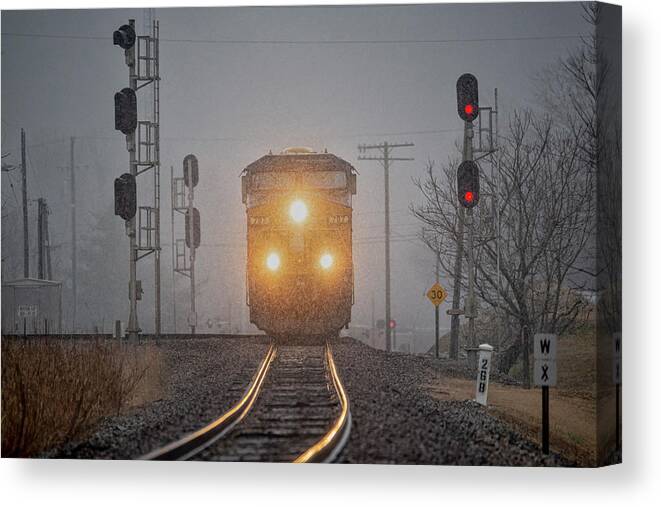 Railroad Canvas Print featuring the photograph Southbound CSX at Mortons Junction during a snow squaw by Jim Pearson