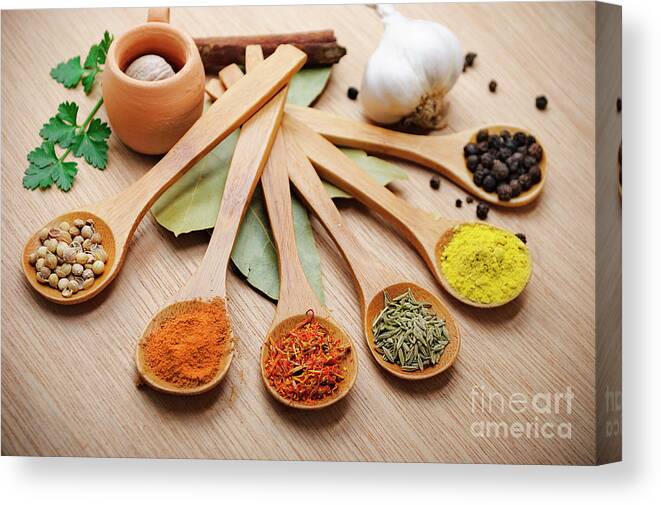 Spice Canvas Print featuring the photograph Spices in wooden spoon by Jelena Jovanovic
