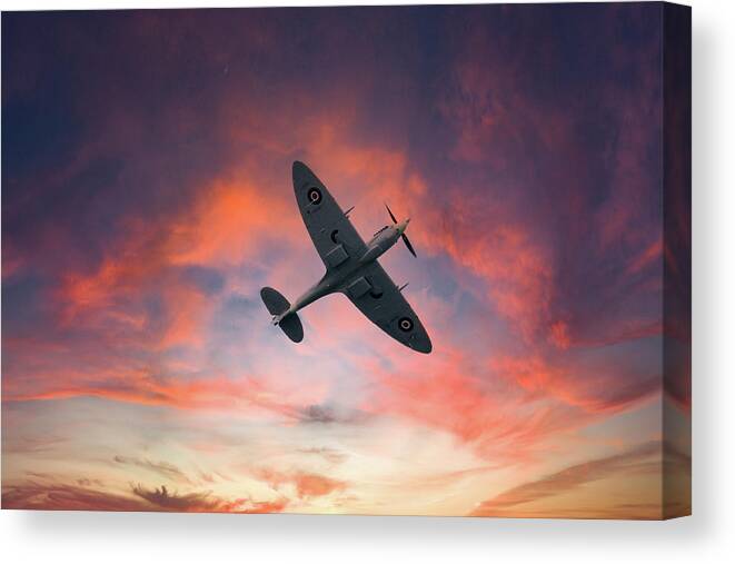Eastbourne International Airshow Canvas Print featuring the photograph Spitfire flying at sunset by Andrew Lalchan