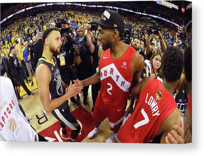 Stephen Curry Canvas Print featuring the photograph Stephen Curry and Kawhi Leonard by Andrew D. Bernstein