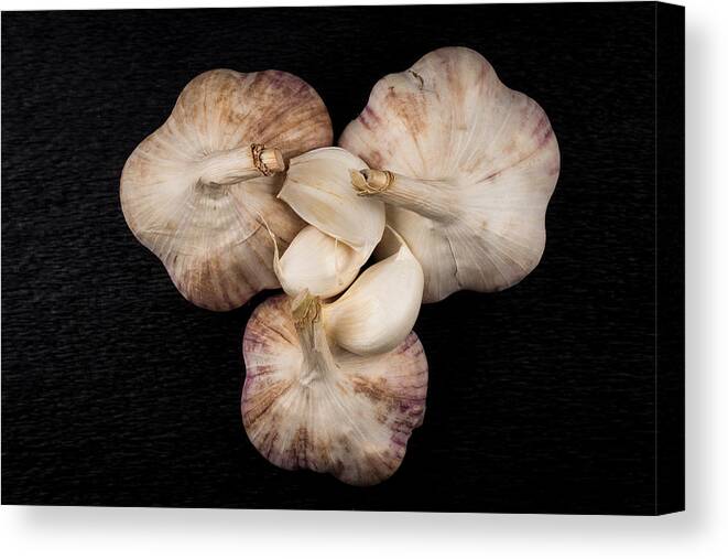 Heap Canvas Print featuring the photograph Still Life Photo Of Organic Whole Garlic On Black Stone Plate by R.Tsubin