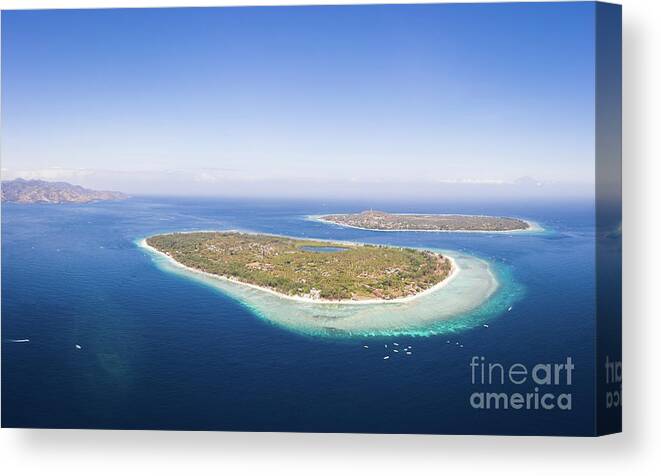 Asia Canvas Print featuring the photograph Stunning view of the Gili Meno and Gili Trawangan in Indonesia by Didier Marti