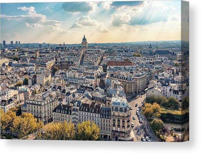 Above Canvas Print featuring the photograph Sunlight Over Paris by Manjik Pictures