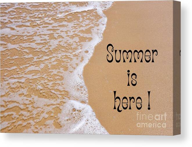 Summer Canvas Print featuring the photograph Summer is Here text on sandy beach. by Milleflore Images