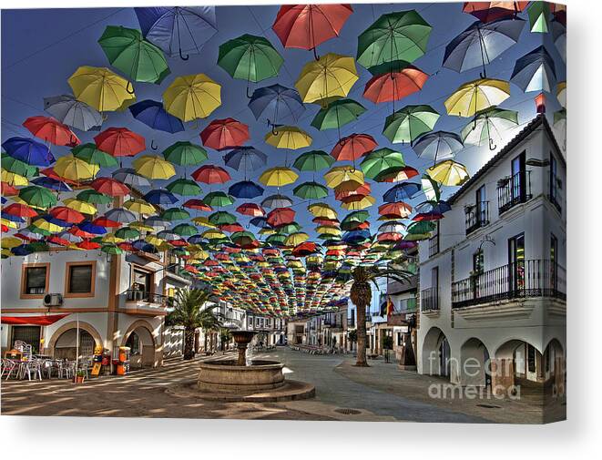 Umbrella Canvas Print featuring the photograph Sun Shadow in Malpartida De Caceres - Spain by Paolo Signorini