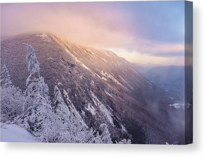 Snow Canvas Print featuring the photograph Sunlight Through The Clouds, Crawford Notch. by Jeff Sinon
