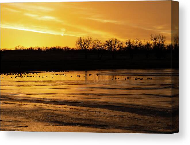 Sunrise Canvas Print featuring the photograph Sunrise over a Winter Lake by Cascade Colors