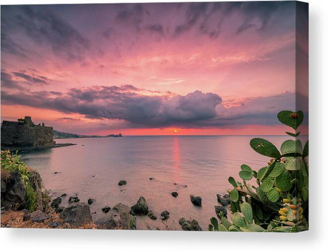 Acicastello Canvas Print featuring the photograph Sunrise over the Sicilian sea by Mirko Chessari