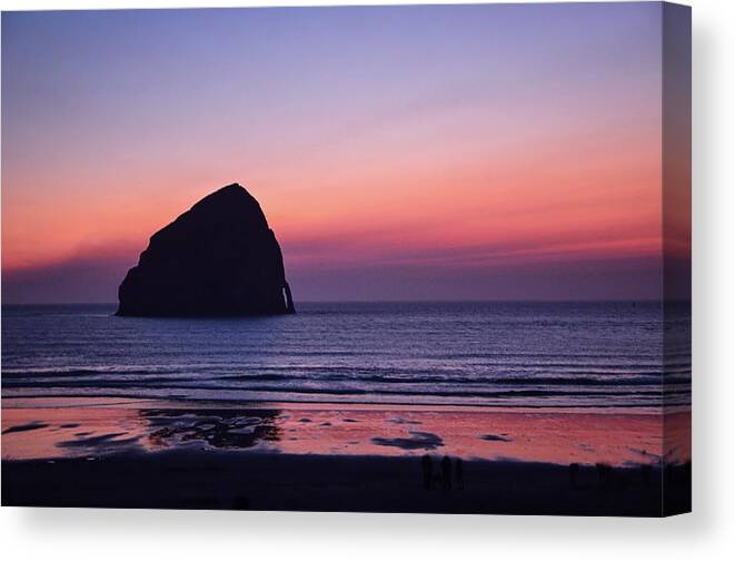Haystack Rock Canvas Print featuring the photograph Sunset Haystack Rock by Marilyn MacCrakin