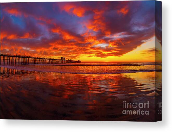 Pier Canvas Print featuring the photograph Sunset in Oceanside by Rich Cruse