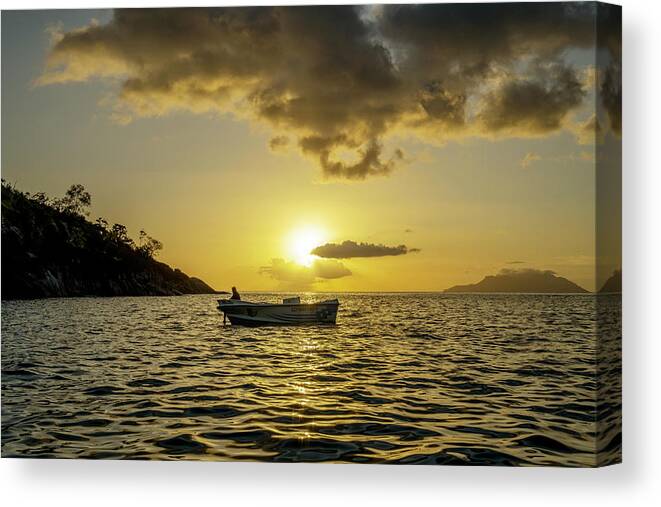 Boat Canvas Print featuring the photograph Sunset in the Indian Ocean 2 by Dubi Roman