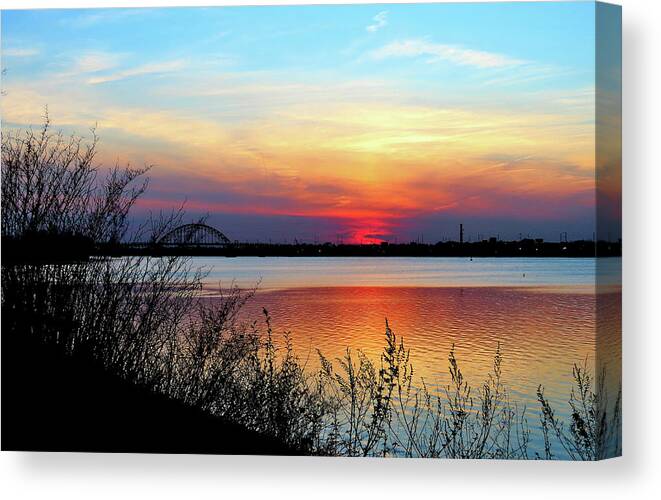Delaware River Canvas Print featuring the photograph Sunset on the Delaware River With Tacony Palmyra Bridge to Philadelphia by Linda Stern