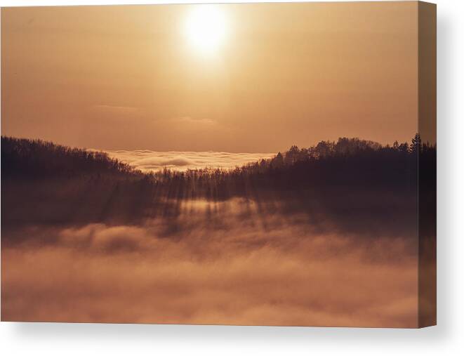 Palkovicke Hurky Canvas Print featuring the photograph Sunset over a sea of clouds by Vaclav Sonnek
