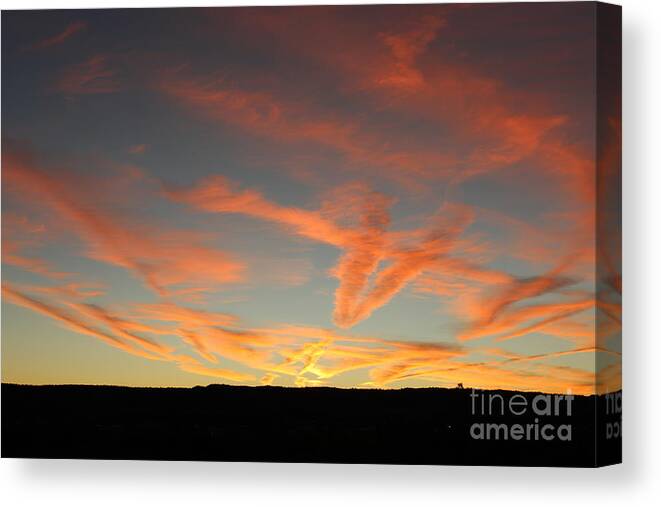 Contrails Canvas Print featuring the photograph Sunset Trails by Doug Miller