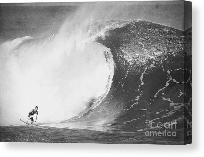 Surf Canvas Print featuring the photograph Surfer Surfing a Big Wave at Pipeline Hawaii by Paul Topp