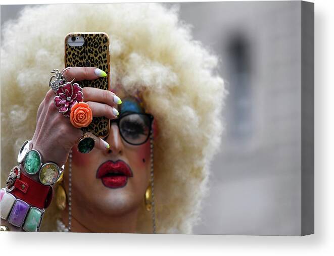 Lgbt Canvas Print featuring the photograph Taking a selfie during Pride in London 2019 by Andrew Lalchan