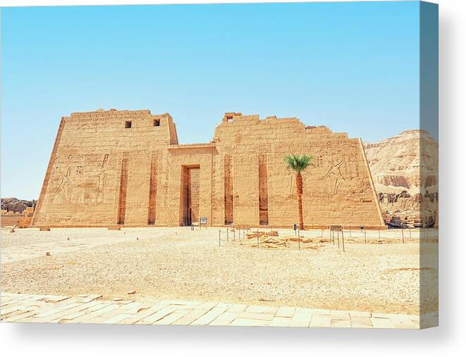 Ancient Canvas Print featuring the photograph Temple of Ramesses III by Manjik Pictures