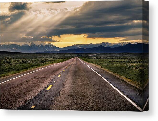 Road Canvas Print featuring the photograph The lonely road at sunset by Link Jackson