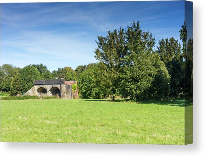 Landscape Canvas Print featuring the photograph The Old Railway Bridge Blandford by Tanya C Smith