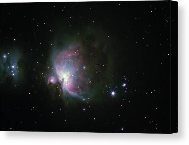  Canvas Print featuring the photograph The Orion Nebula in the constellation of Orion by Mihai Andritoiu