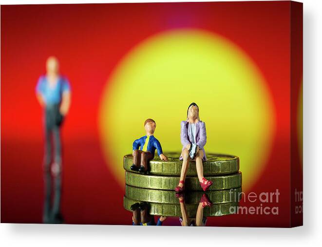 Contract Canvas Print featuring the photograph The parent is handcuffed to the child. The concept of parental debt. Alimony payment. Custody, care and maintenance of minor children. Responsibilities in the family. Family code. Property management Macro by Pablo Avanzini