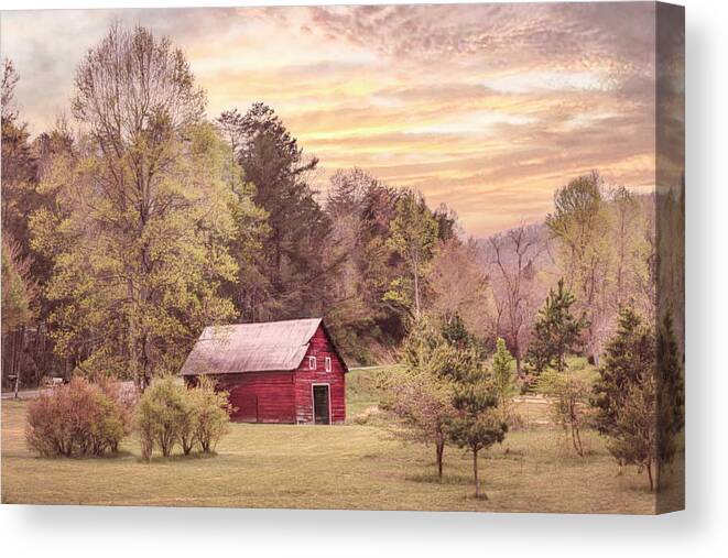 Barns Canvas Print featuring the photograph The Red Country Barn at Sunset by Debra and Dave Vanderlaan