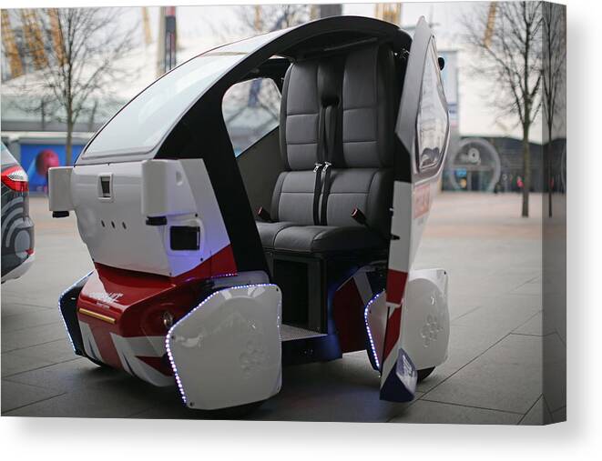 England Canvas Print featuring the photograph The UK's First Driverless Pods Are Unveiled At The O2 Arena by Dan Kitwood