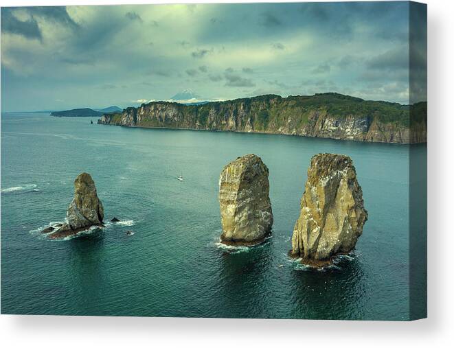 Rock Canvas Print featuring the photograph Three brother rocks in Avacha bay by Mikhail Kokhanchikov