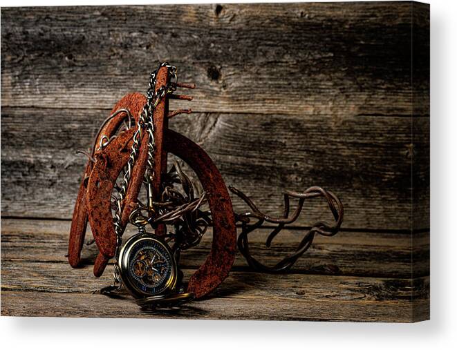 #horseshoe #barbedwire #pocketwatch #wood #art #photography #can Canvas Print featuring the photograph Time and Rust by Jay Stockhaus