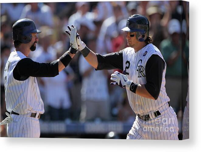 People Canvas Print featuring the photograph Todd Helton, Troy Tulowitzki, and Bill Bray by Doug Pensinger