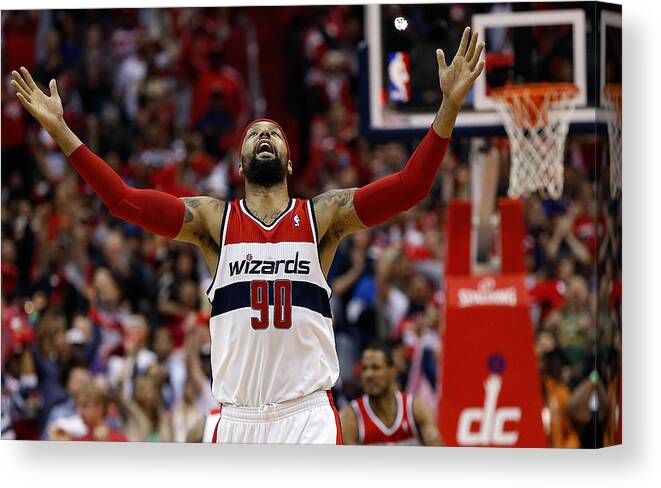 Playoffs Canvas Print featuring the photograph Trevor Ariza and Drew Gooden by Win Mcnamee