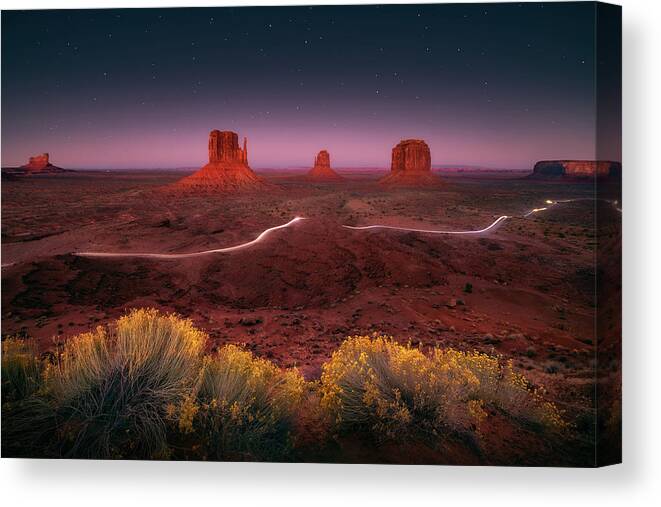 Sunset Canvas Print featuring the photograph Twilight at Monument Valley by Henry w Liu