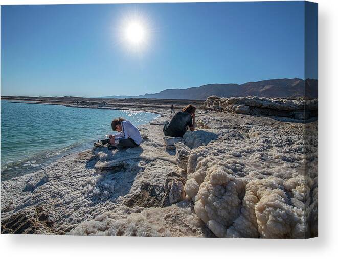 The Dead Sea Canvas Print featuring the photograph Two Photographers at the Dead Sea by Dubi Roman