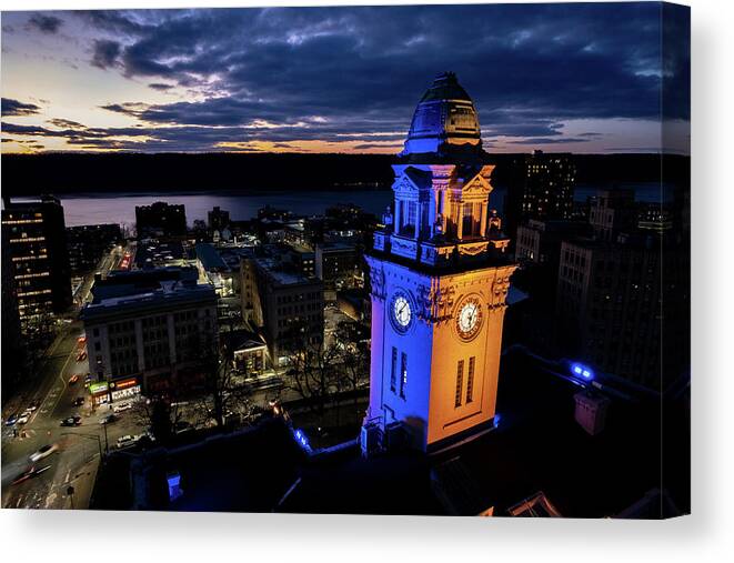 City Hall Canvas Print featuring the photograph Ukrainian national colors illuminate city hall by Kevin Suttlehan