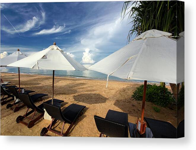 Water's Edge Canvas Print featuring the photograph Under tropical skies by Igor Prahin