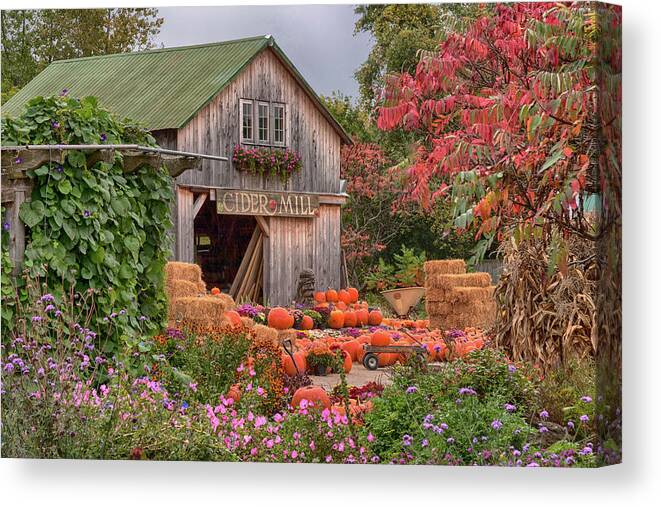 Hudak's Canvas Print featuring the photograph Vermont pumpkins and autumn flowers by Jeff Folger