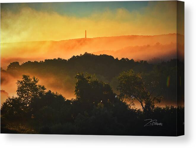 Sunrise Canvas Print featuring the photograph Veterans Monument in the Misty Morning by Ingrid Zagers