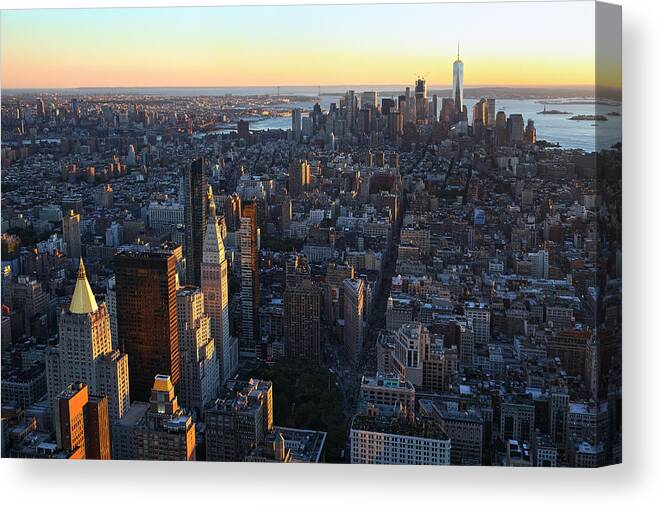 Downtown District Canvas Print featuring the photograph View to Downtown Manhattan at sunset by Rainer Grosskopf