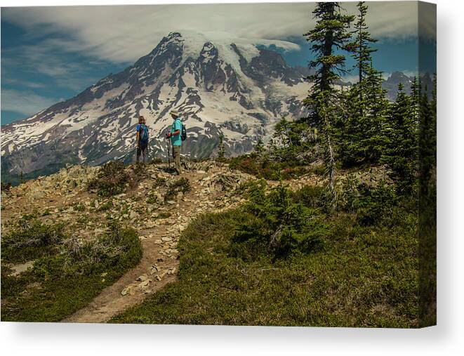 Mount Rainier National Park Canvas Print featuring the photograph Walking in the Mountain's Shadow by Doug Scrima
